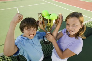 Brother and Sister with Tennis Trophy